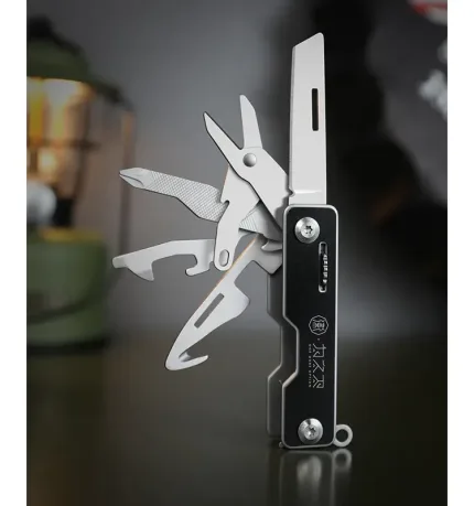 WETACTICS 6-in-1 keychain tool with deployed scissors and phone stand